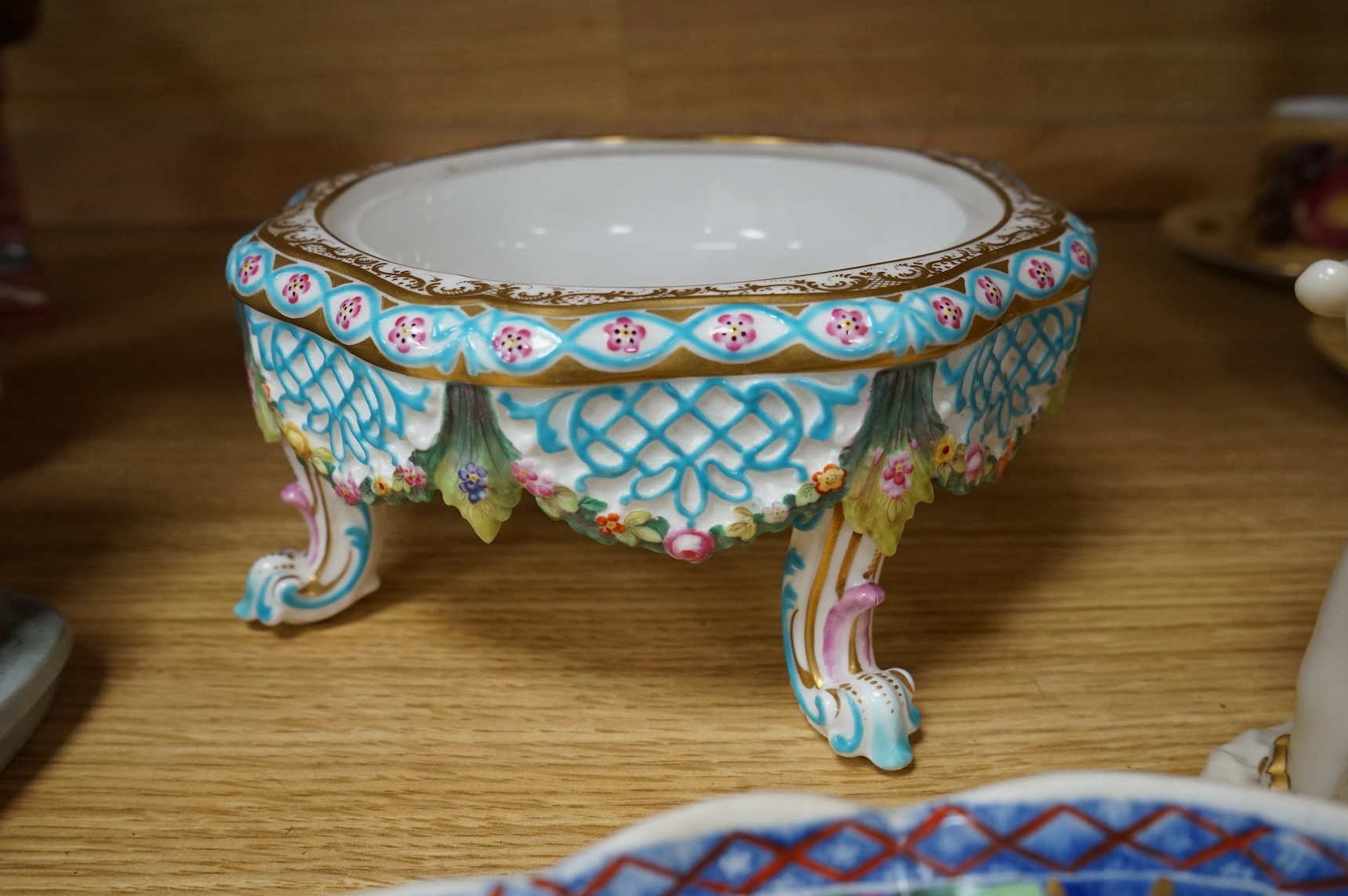A Victorian Royal Worcester Hadley’s hand vase, a Spode dish and a Meissen style centre piece, largest 27cm wide